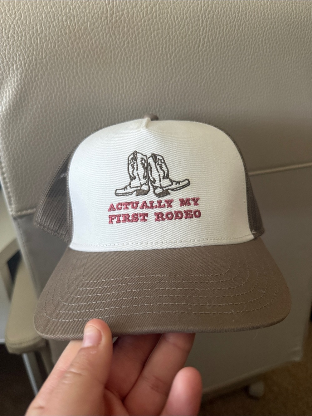 Brown and White 'Actually My First Rodeo' Trucker Hat